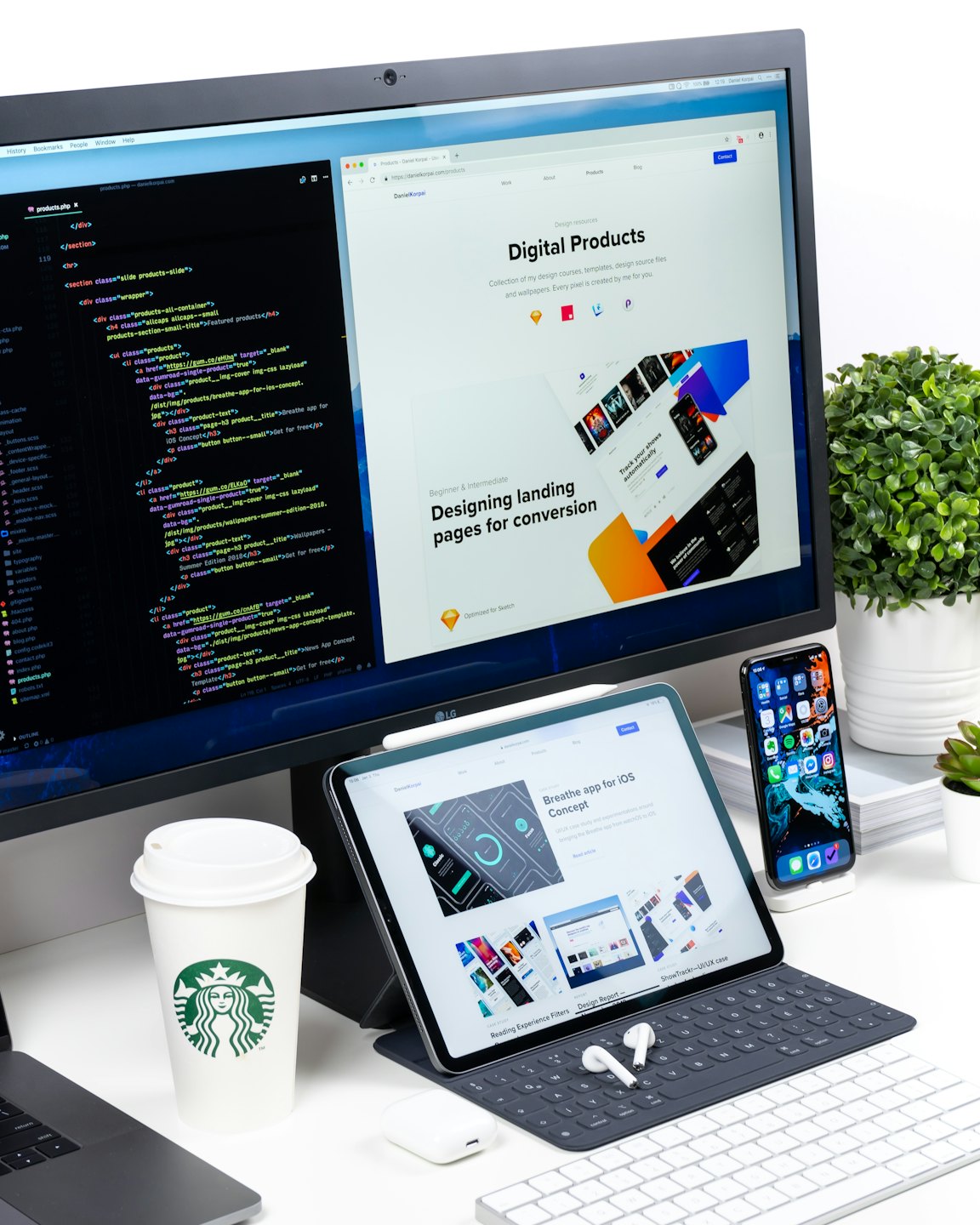 a phot of a computer, tablet and phone with a coffee cup